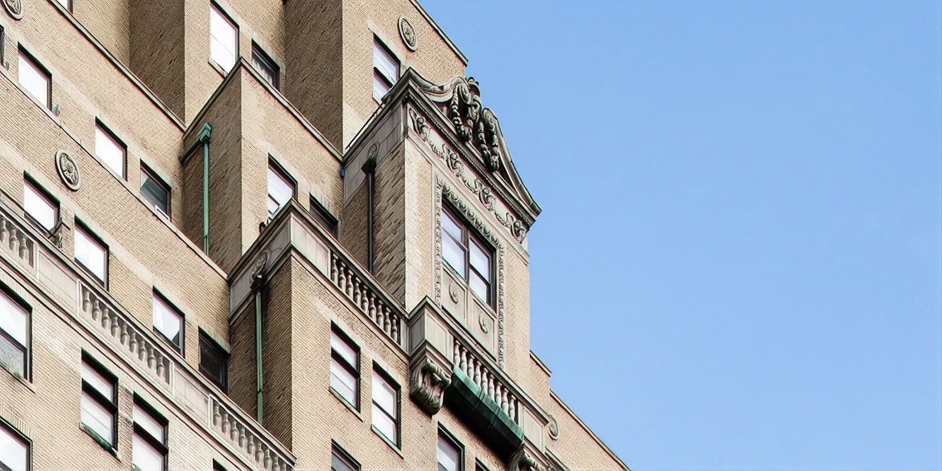 Terra cotta gable pediment and balustrades at 253 West 72nd Street, Manhattan