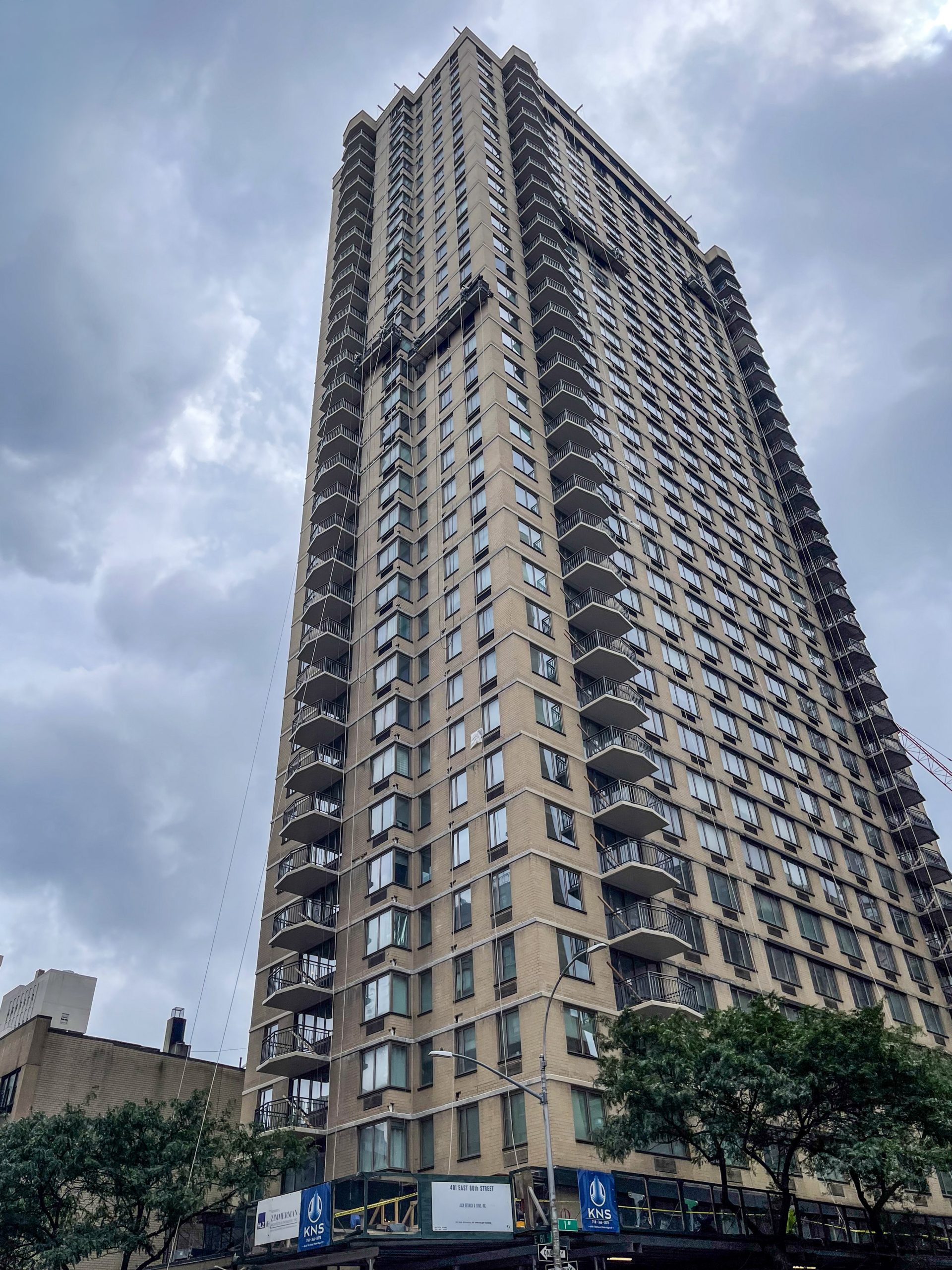 Local Law 11 facade restoration at Gracie Mews, 401 East 80th Street, Yorkville, Manhattan